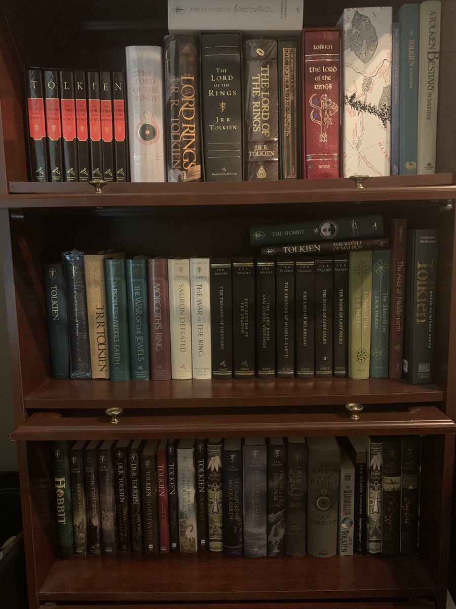 winb99's tweet photo. @TolkienSociety I’ve been reading Tolkien since the 70s. This is just a portion, including my 1st Editions of The Silmarillion and the  History of Middle Earth. My favorites are the green and leather bound slip covered editions. https://t.co/PuVg0i78Zn