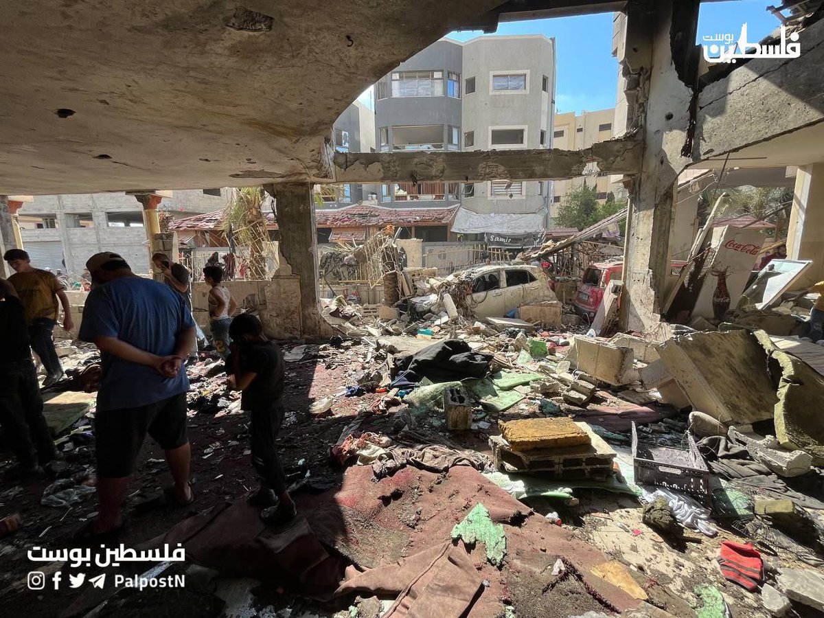 Timesofgaza's tweet photo. Scenes from the sight of the lsraeli massacre committed this dawn east of Gaza city, which led to the killing of more than 100 displaced Palestinians while performing their prayer. https://t.co/EREGsOQW5I