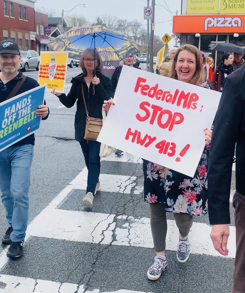 BEYNDP's tweet photo. Held during Earth week this year, a #Stop413 rally was organized by local citizens. Crowds honked and cheered as they marched  to the Liberal MP @beynate’s office with a simple message: Restore the Environmental Assessment Act! 
#BEY #BeachesEastYork #StopthsSprawl https://t.co/ggpTJqBqag
