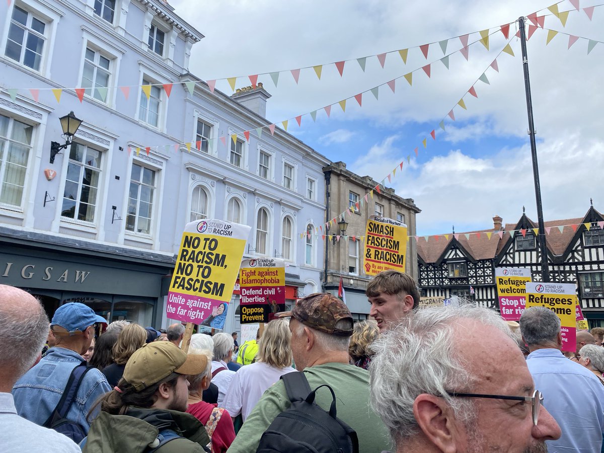 Shrewsbury Saturday afternoon in the Square. Shropshire and Telford Stand Uo To Racism has a good and peaceful ( of course) turn out. Also 3 rather overweight gentlemen with flags attended their own little huddle.