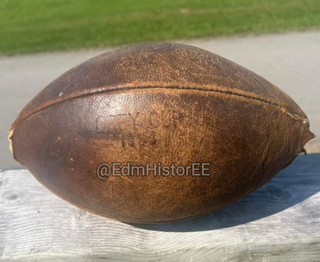 EdmHistorEE's tweet photo. 1956 Grey Cup-used football. One of 18 used in the championship game, this ball was kicked through the end zone, and was found by a fan between two vending machines after the game. Edmonton beat Montreal 50-27, and the final TD was unconverted, as they ran out of footballs. https://t.co/yYgrnpG6Nd