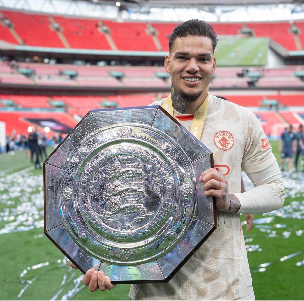 Ederson celebrates winning the community shield.