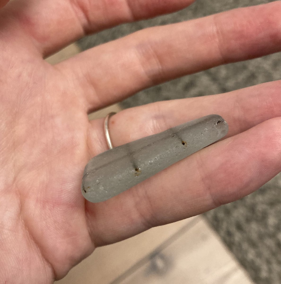 I found this cool beach glass it’s relatively mundane looking overall but I just like how it’s made from that reinforced glass with a metal wire lattice inside and that’s still in there