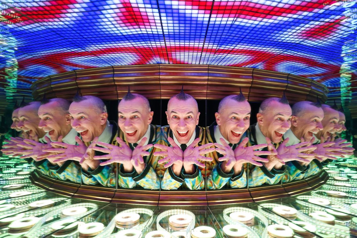 Italian illusionist Arturo Brachetti performs in the mirrored mazes of Camera Obscura in Edinburgh, Scotland, on Tuesday, August 6.