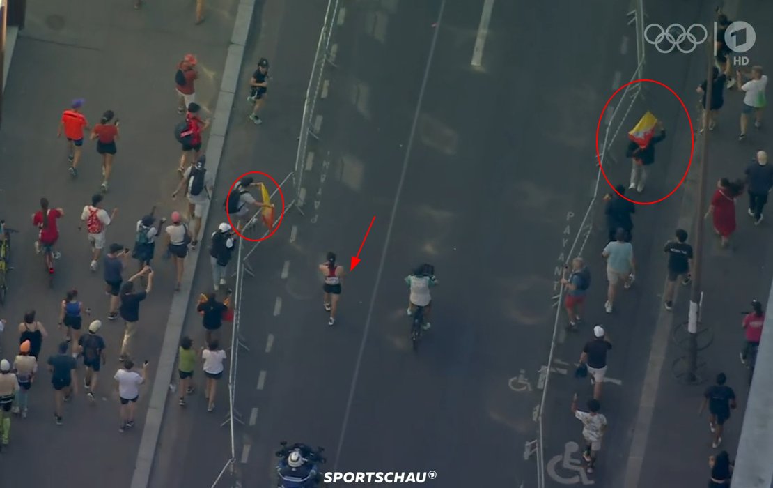 The last woman in the Olympics marathon is still fighting. She is walking it but she wants to finish.

Her name is LHAMO Kinzang and she is the only female Athlet from Bhutan.

The crowd bought Bhutanese flags in order to help her and cheer for her.

It's really moving.