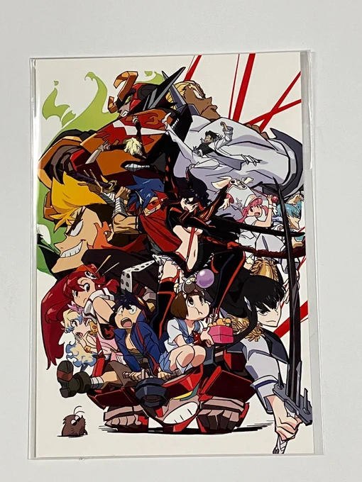 購入物のポスカとランダムシールとカード。
グレンラガンのタイトルロゴ、これは当たりすぎる!
でも、コレ出るとカードはカミナがよかったなぁという欲が💦 