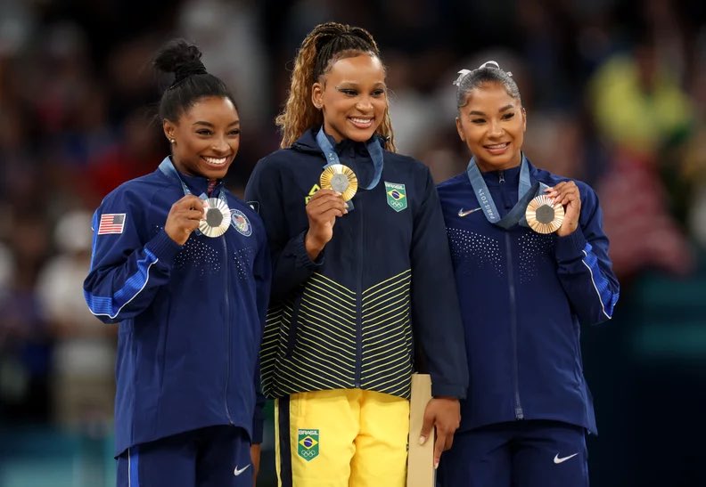 ianmiles's tweet photo. Olympic bronze medalist Jordan Chiles just lost her medal in gymnastics. And now people are crying “racism,” including her sister Jazmin. 

She stood alongside Simone Biles and Brazil’s Rebeca Andrade for the first ever all-black podium—but the ruling was clearly nonsensical and biased against Romanian gymnast Ana Barbosu, who didn’t win because the judges decided that an all-black podium would send a strong message of diversity for the gymnastics, which has been long dominated by whites. 

Team USA lodged a last minute on-floor appeal during the competition that vaulted Chiles to the top above the white competitor. The judges added 0.1 to her score, which was enough to put her in third place. But a further review by the IOC found that they added the score a minute after window was up. 

It was literally a last minute decision so they could have an all-black podium finish.