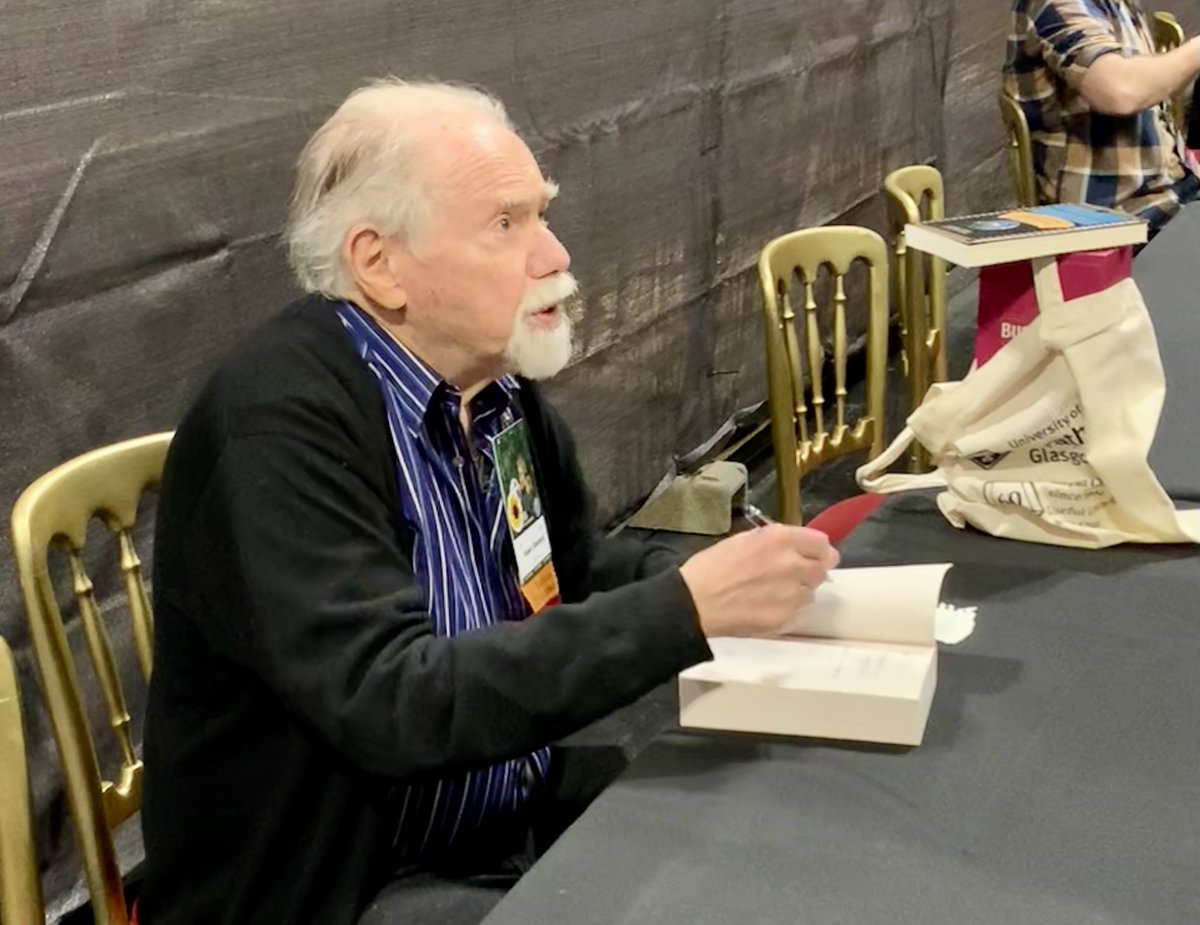 p_clift's tweet photo. Legendary sci-fi writer Robert Silverberg signs copies of his book at the World Sci-fi Convention in Glasgow.  He is a multiple winner of Hugo and Nebula awards. #sciencefiction https://t.co/jULfbrVuPw