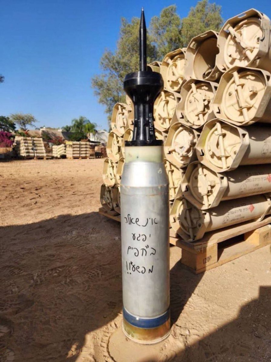 The text translates to:

"May it explode on innocent people."

This is ziønism.