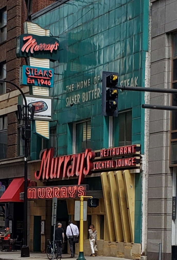 PhilBerbig's tweet photo. Walking through downtown Minneapolis in the spring of 2023 I had to snap a shot of the Murray's sign that had been on South 6th  Street since 1946. I've never been there, but do love the sign. https://t.co/KIyFvmEqnC