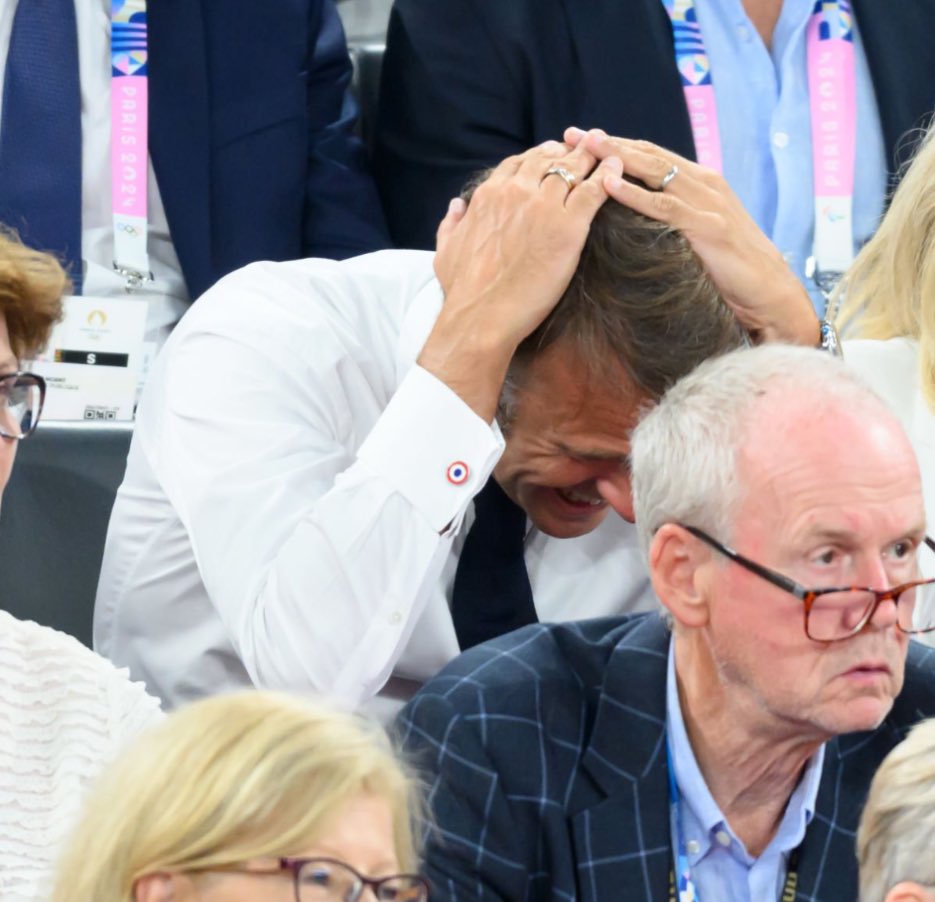 WarriorsMuse's tweet photo. French President Emmanuel Macron going through it during the Steph show https://t.co/HH59xqK8gf