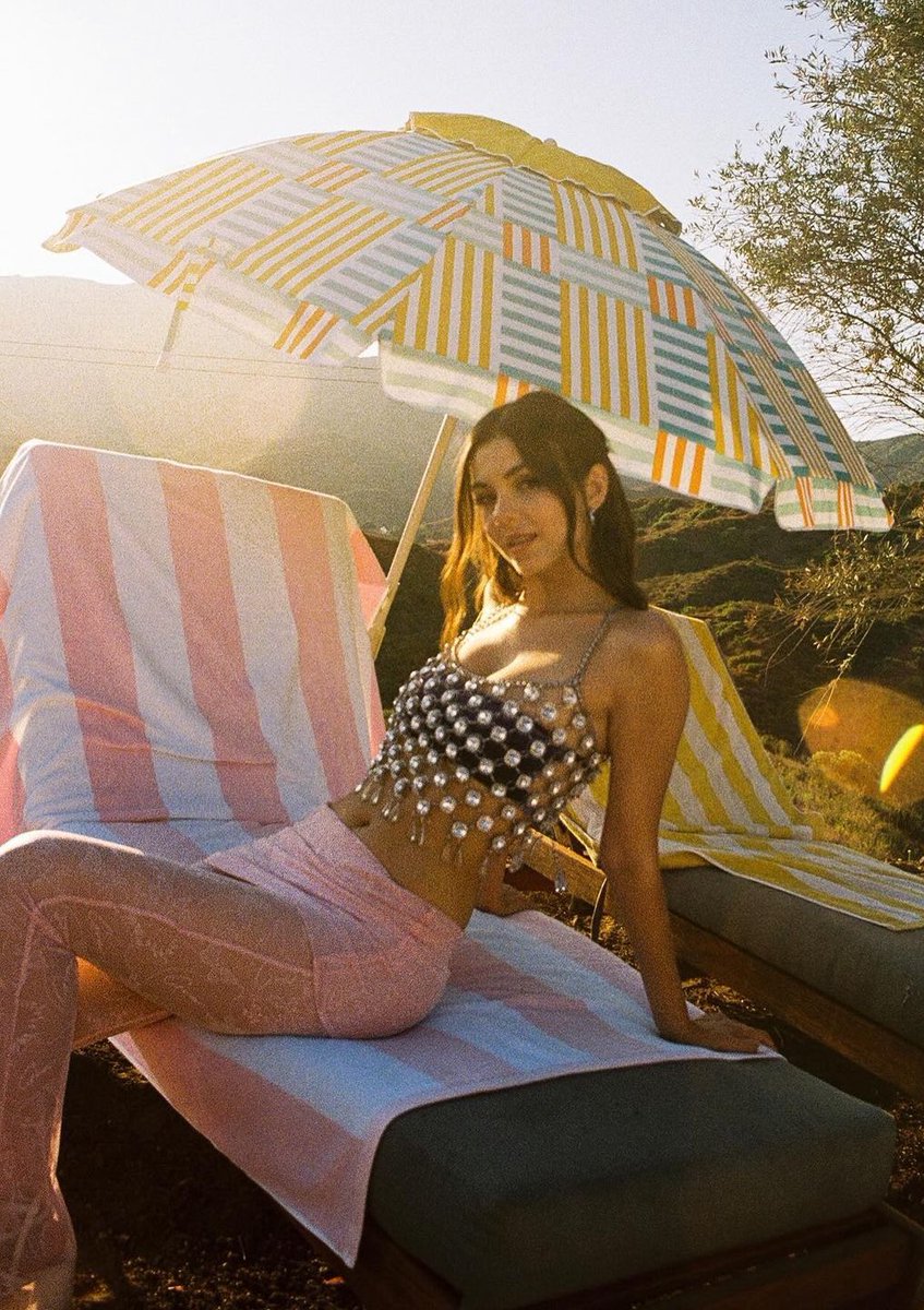 Appreciating a SUNday in the sun. A drink in my hand a good book in my lap is all I need