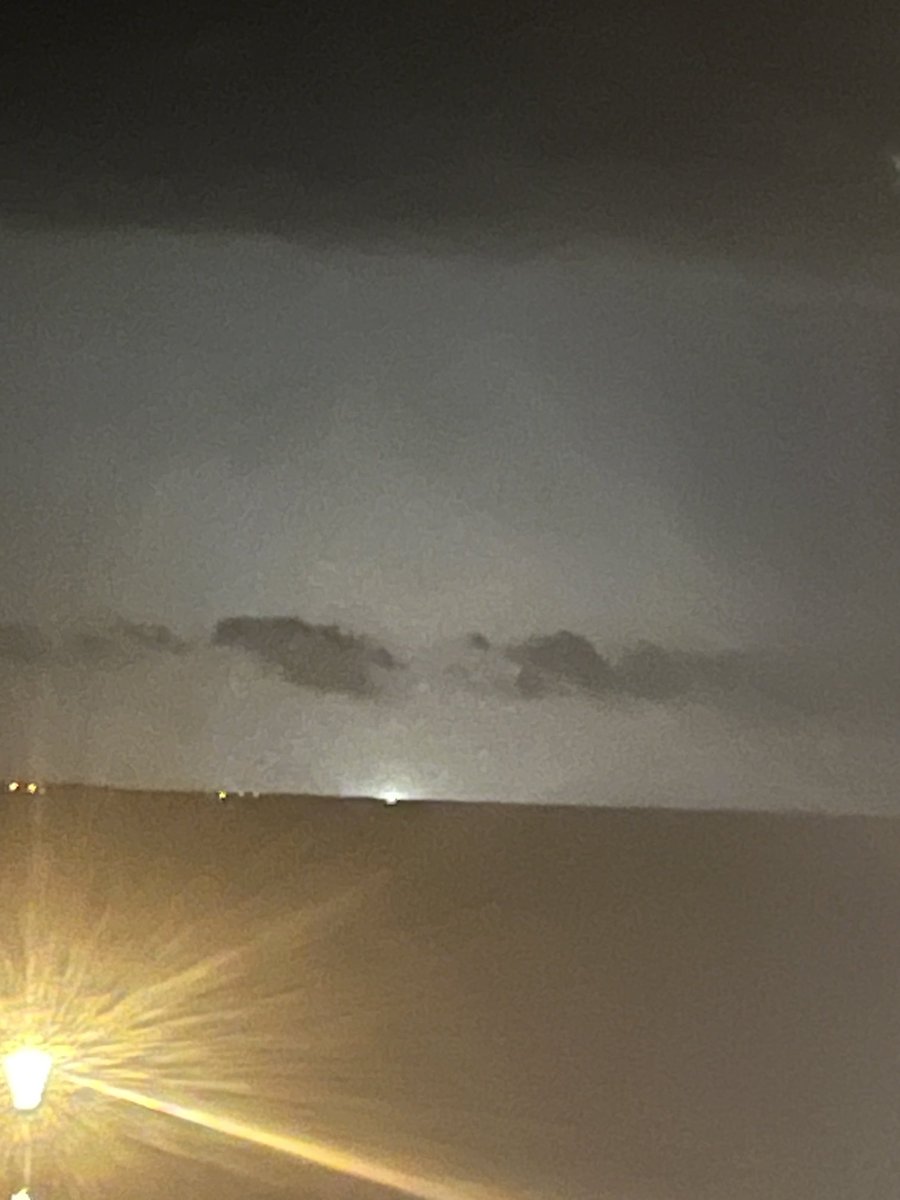 Something major hit in Clare ⁦<a href="/CarlowWeather/">Carlow Weather</a>⁩ view from Salthill. Glowing for a good few minutes since.