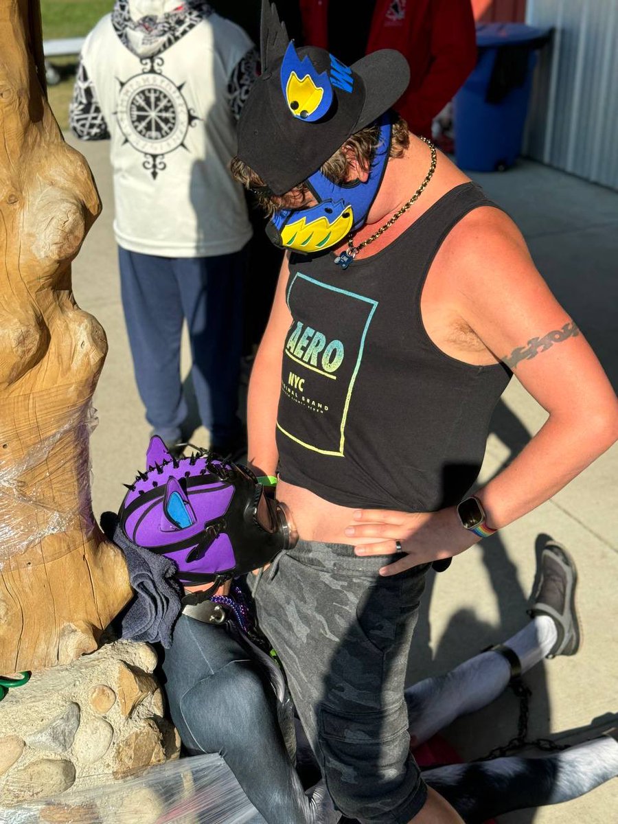 PupLink1's tweet photo. While waiting for breakfast at camp, I found @PupTraxx was also waiting for some sausage. Was shackled and tied to a post so I felt bad and had to feed the puppy. https://t.co/Bt6EcSmTxE