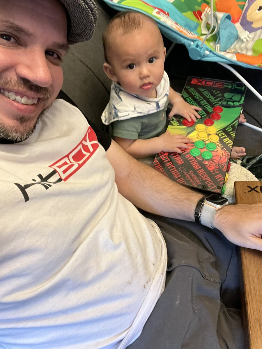 Dreaded_87's tweet photo. I’m getting my son started on his fighting game journey. I am letting him use my old custom @hitboxarcade controller! https://t.co/PfieNHMm3a