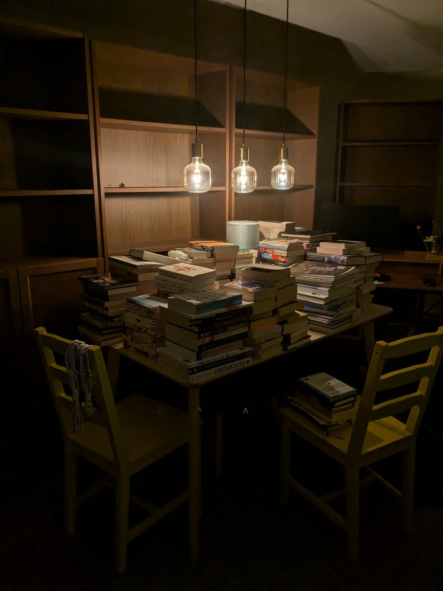 lostinink_'s tweet photo. Redecorating my library and accidentally making art instead https://t.co/jJjpmoiZwx