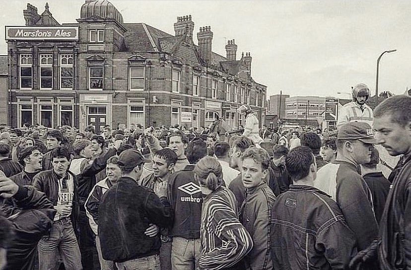 DavisArchive's tweet photo. Day 1 let’s have a week of football terrace culture. Victoria Ground early 90s. This is probably the best known image of my Stoke Lads series. This is 2.55 just before Stoke City v Port Vale 1992 Stoke on Trent. Available as a print @britcultarchive #stoke #footballlads https://t.co/Q6ZDbOfwJh
