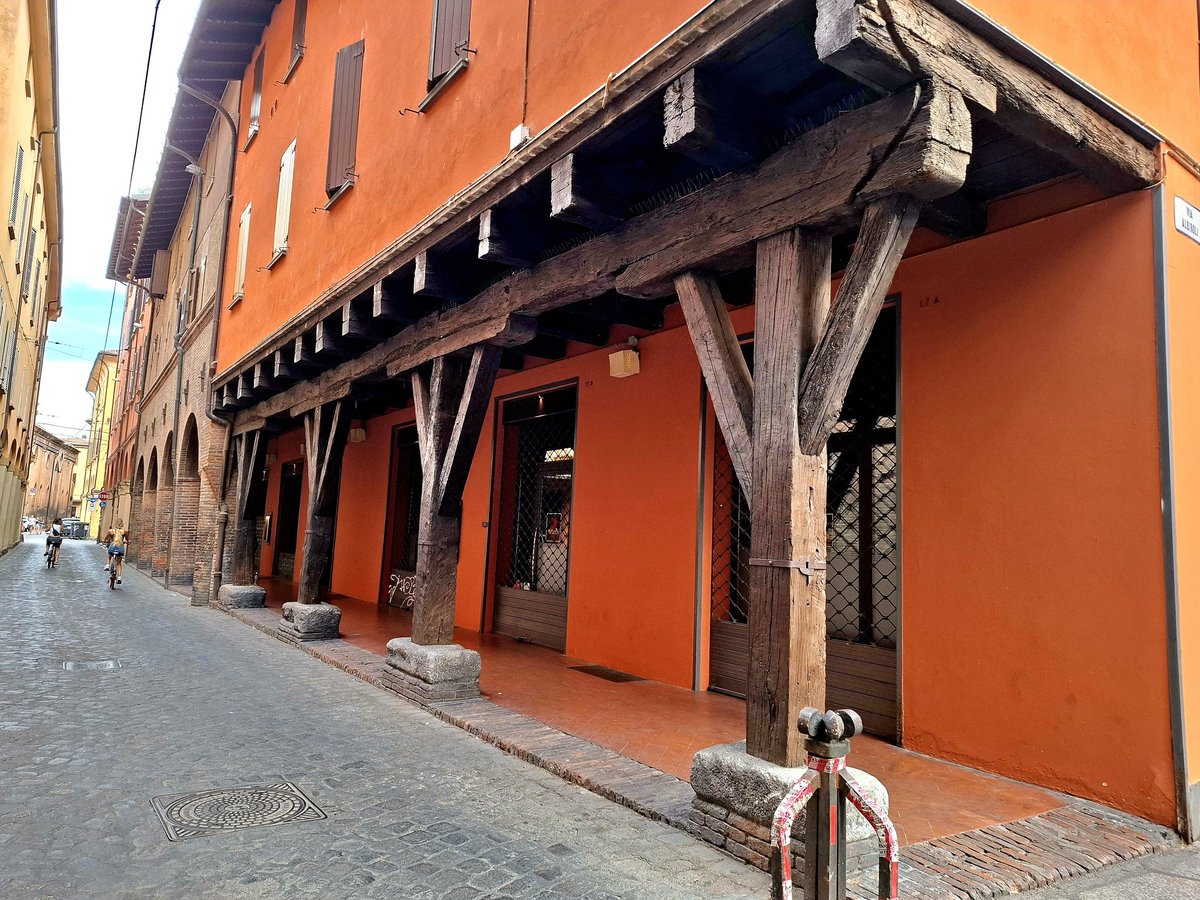 I posted about the beauty of Bologna's porticoes before, but I didn't realise there are a still a few of the original, wooden-style porticoes in existence.