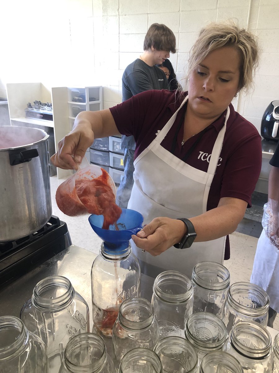 TCCTC1's tweet photo. Culinary Arts II was  excited to kick off this year in the kitchen learning how to can whole tomato’s fresh out of the garden! #canningandpreserving #handsonlearning #CTEWorks https://t.co/OH49k1Zpu0
