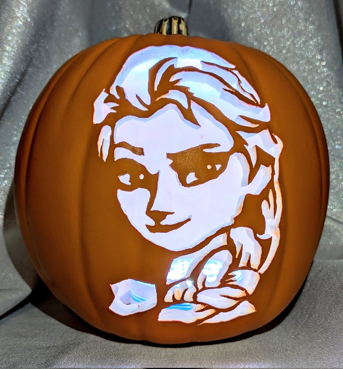 HauntedCarving's tweet photo. First carve of the year! This Elsa design from Ultimate Pumpkin Stencils was carved only 6 inches high with VERY delicate floating elements, especially in the face. Harder than it looks! 

Time to "let her go" to her new home. She's destined for a 4 year old princess in training. https://t.co/54DBCyBCp1