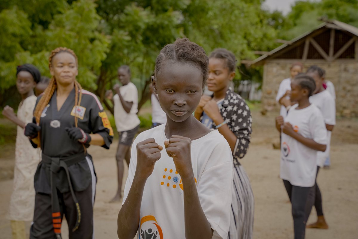 filmaidkenya's tweet photo. Excited for the Taekwondo Clinic with National Role Model Caroline Evelyne Ambani in Kakuma! This event will empower young women with self-defence skills, fight GBV, and build safer communities.  @RESCUEorg   @KRCS for supporting this! #SportsForProtection #EndGBV @UNFPAKen https://t.co/lnEvOYQ39B
