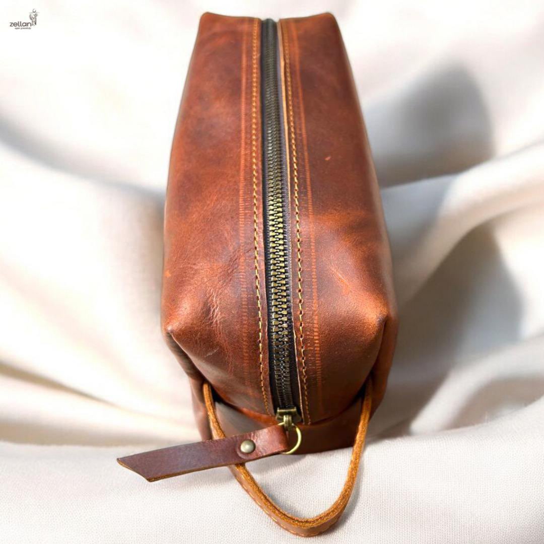 Yon277's tweet photo. Details:
Material: Genuine Leather &amp; African Fabric
Colour: Light brown, navy blue
Types: Unisex Toiletry bag
Size L 22cm | W 8cm | H 14.5cm
 
#ZellanBag #EthiopianLeather #AfricanStyle #TravelOrganizer 
 
Call: 251911176008
https://t.co/FoiLSCSw1q
Email:zellanleathers@gmail.com https://t.co/iyMsSiboNT