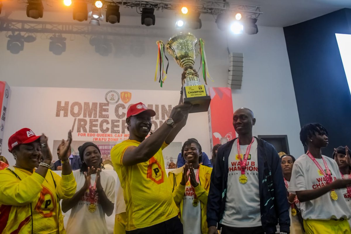 Victory in Her Hands! 🏆✨ Yussuf Godwin Alli official Passing the Torch of Triumph! presents the CAF women's Champions League WAFU B qualifiers trophy to our beloved First Lady, Betsy Obaseki. Edo Queens have made history, and we share this victory with the heart of Edo State
