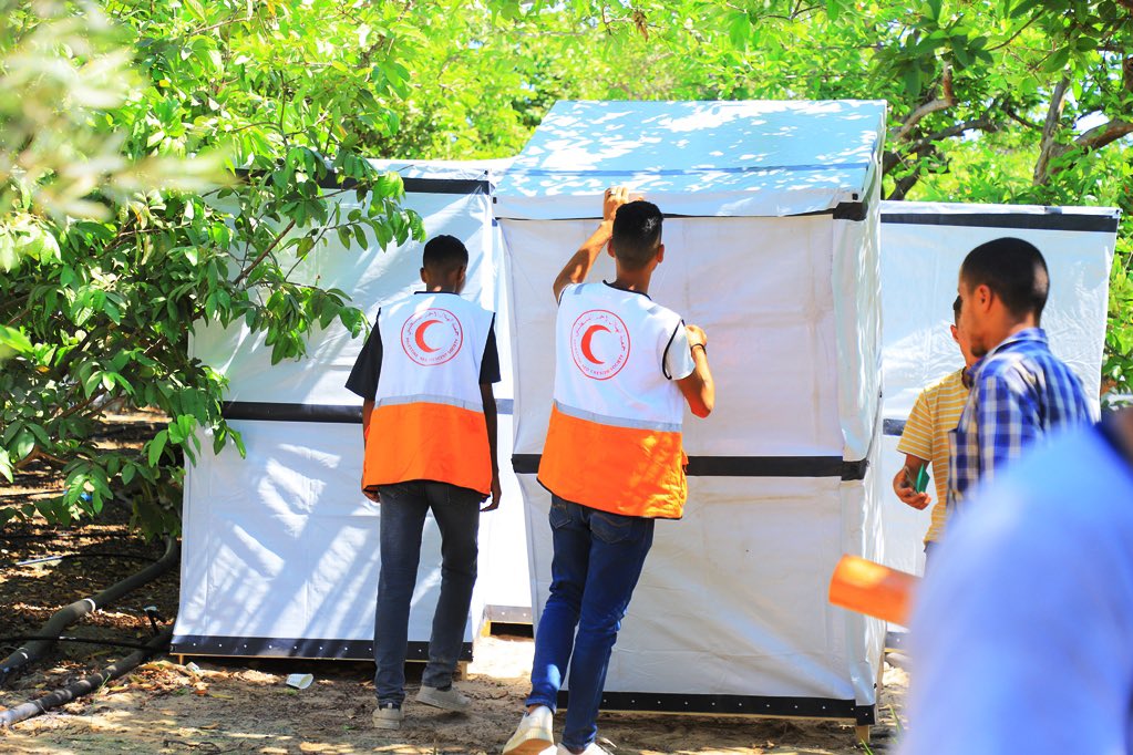 PalestineRCS's tweet photo. The PRCS Disaster Risk Management teams in collaboration with the International Committee of the Red Cross, distributed around 500 portable toilets in several displaced persons’ gatherings in the Al-Mawasi area of #KhanYunis. https://t.co/5i6QN5c5pH