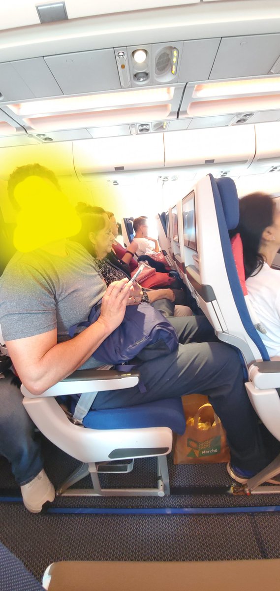 SpringsCorner's tweet photo. Airlines are getting more and more greedy. He is only 6'1" and his knees touch the seat in front of him. His shoulders are wider than the backrest of his seat. #airlines pack passengers like sardines. #Americanairline #edelweiss #deltaairline #frontierairline #spiritairline https://t.co/UiXA3hoySK