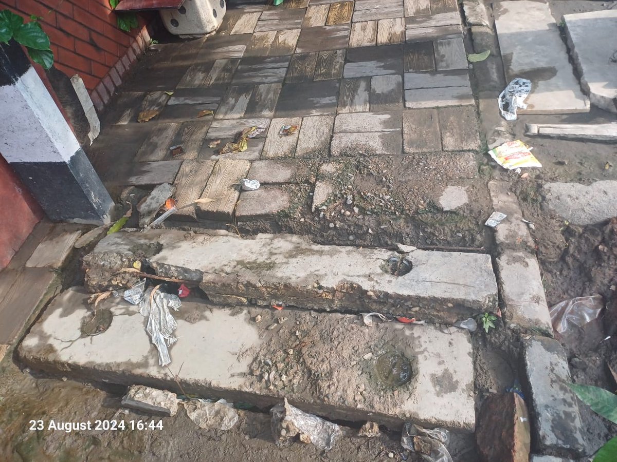 ishant_j's tweet photo. The footpath outside my house in Model Town-1 has caved in &amp; pose a serious risk to pedestrians. The sewer is broken. The muck has been left outside leading to breading of mosquitos in dengue season. Calls for Urgent attention &amp; repair  -- @DelhiPwd  @MCD_Delhi https://t.co/cis0HorxeL