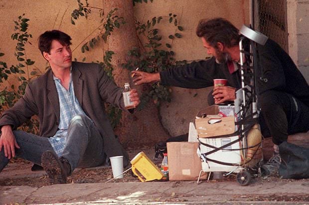 TimelessHist0ry's tweet photo. In 1997, Keanu Reeves was photographed in West Hollywood spending time with a homeless man https://t.co/ndgg46rONu