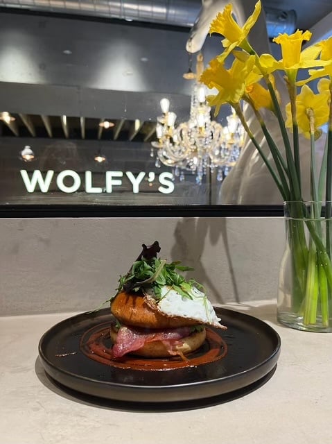 WolfysBar's tweet image. Start your day off right with our bestselling Bacon Bagel at Wolfy's Bar! 🍳🥯 Perfectly toasted with crispy bacon, creamy avocado, and spicy chili jam. Don't miss out on this delicious menu item! #BaconBagel #WolfysBar #BreakfastBoost #BestSellers linktr.ee/wolfysbar