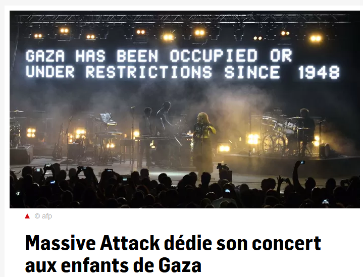 racmess's tweet photo. Le groupe Massive Attack dédie son concert à Gaza avec de grands messages sur scène.

#Stop_Gaza_Genocide 🇵🇸 https://t.co/MgNrBj14v5