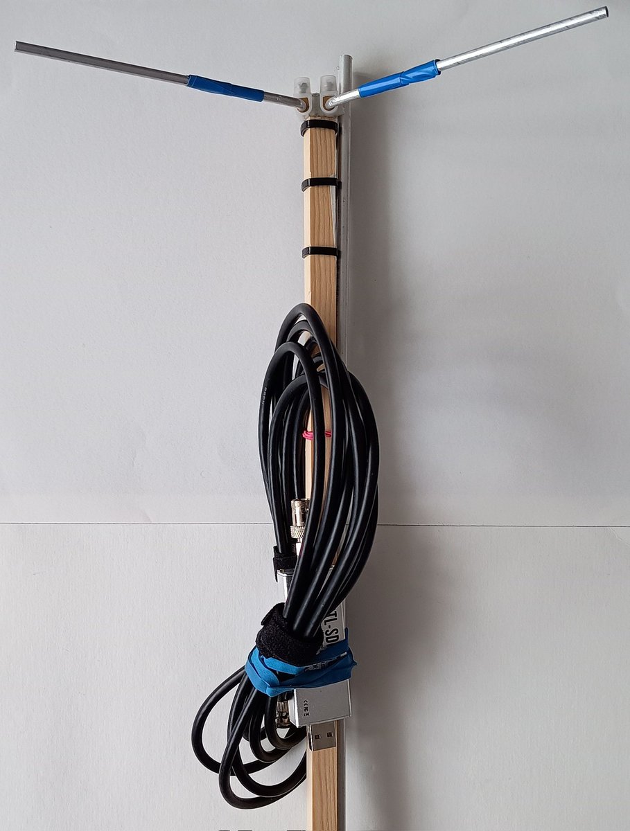 Design for a portable antenna to receive <a href="/NOAASatellites/">NOAA Satellites</a> possibly on the #Solar #computer potentially rendering weather images in the field? Further rods just about visible on the wooden post extend the main v shaped poles. RTL-SDR acts as the receiver.