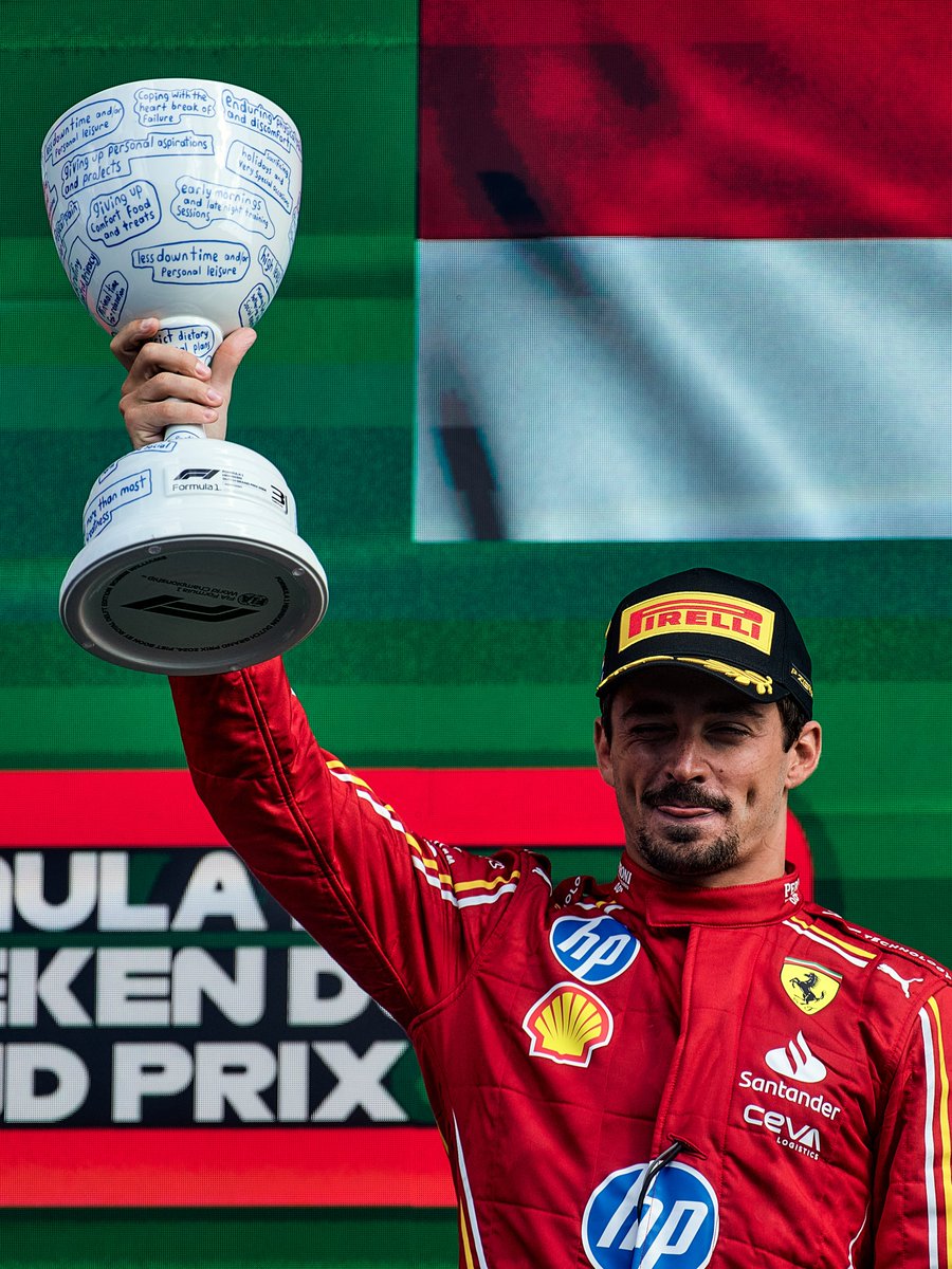 ScuderiaFerrari's tweet photo. Delivering your Sunday podium pictures 📸🏆

#DutchGP 🇳🇱 #F1 https://t.co/YHByVbCfP0