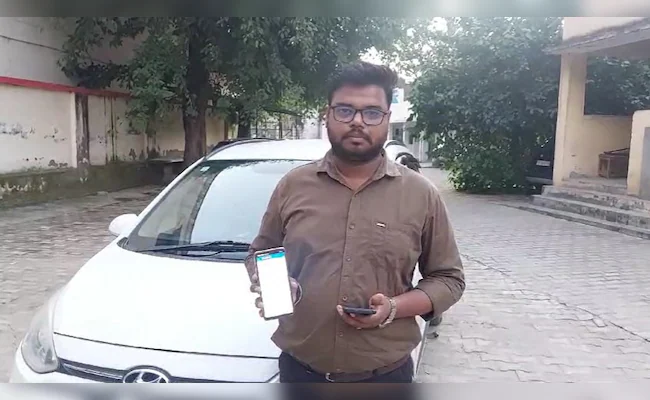ndtv's tweet photo. UP Man Fined For Driving Car Without Helmet By Noida Police https://t.co/ffKnL7UBga https://t.co/RCXE3RsEL3