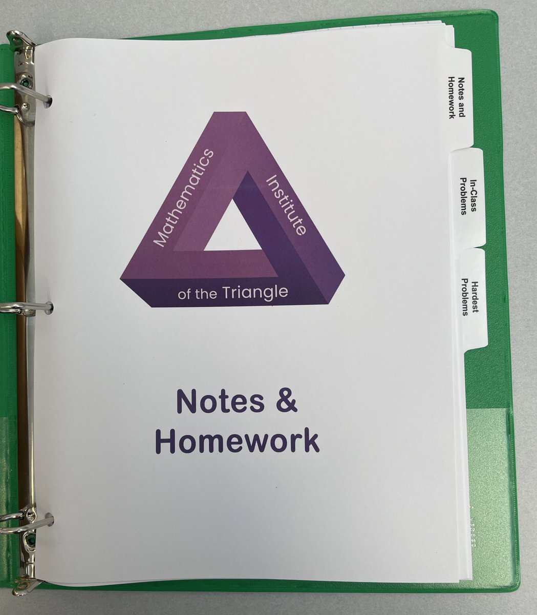 triangleMath's tweet image. T-shirts and organized binders ready to go - we also have #vegan cake for our first big day of classes! #mtbos
