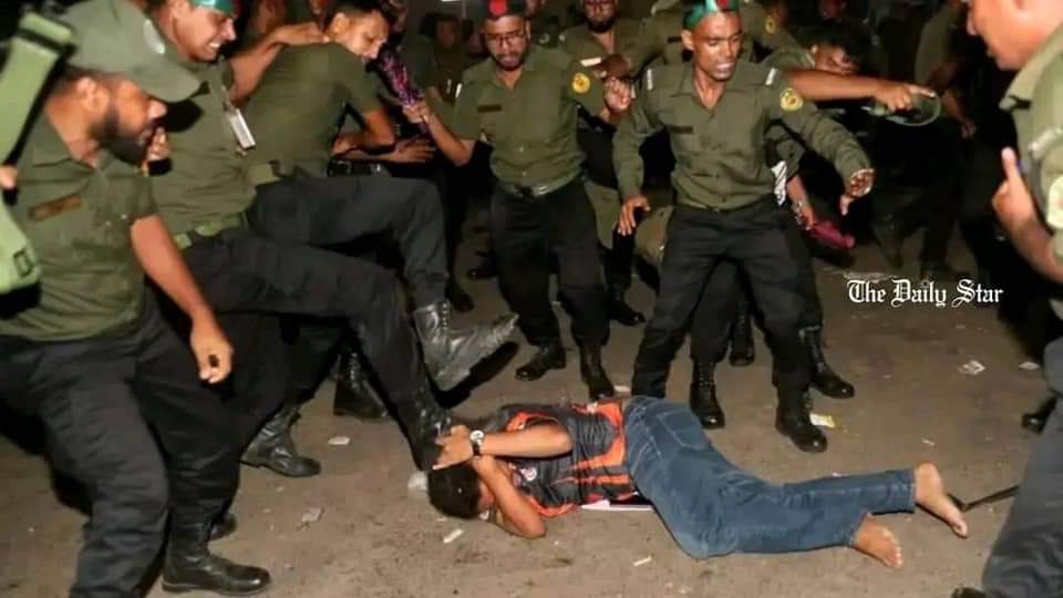 tasmimmahmud's tweet photo. @sajeebwazed @sajeebwazed I'm sure the student lying there was attacking the Ansars. https://t.co/CG937qcXZO