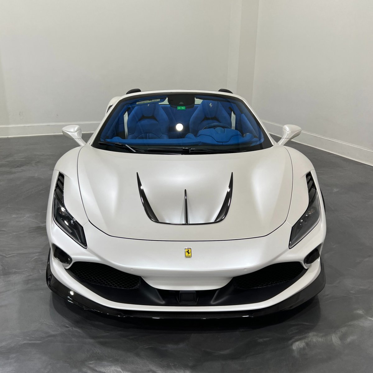 duPontREGISTRY's tweet photo. 2021 Ferrari F8 Spider 💙 

This example is fitted with a 1016 Industries Carbon Body Kit, Custom Forgiato Wheels, a Satin Mist Pearl exterior, &amp; a Nipsey Blue interior

Now available on #dupontregistry https://t.co/rRM3JTELhs