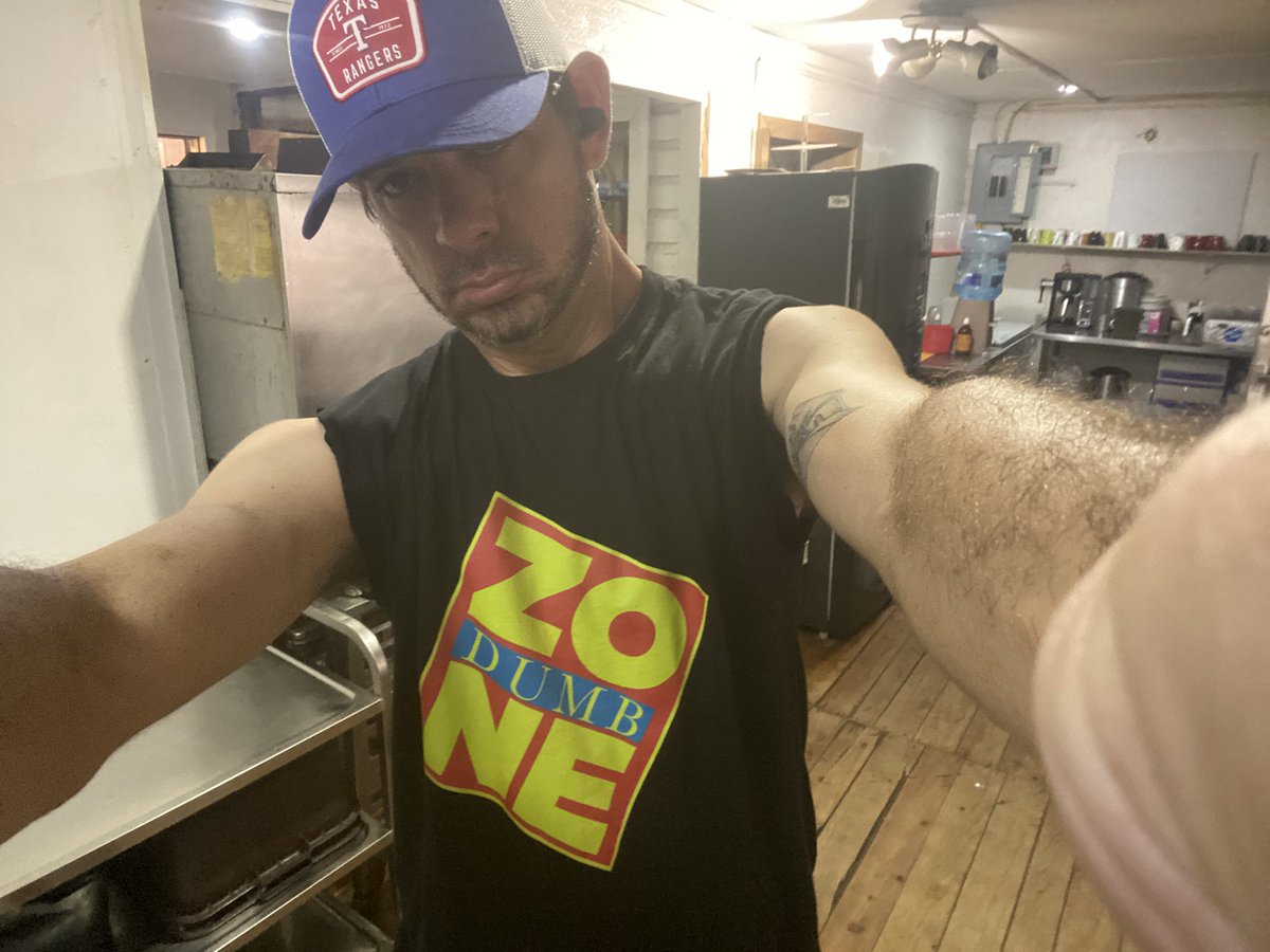 Timshark06's tweet photo. @thedumbzone very humid in Roatan Honduras. And running a bakery, so I had to cut them sleeves off. #oldmanmove https://t.co/qVG4otJtOY