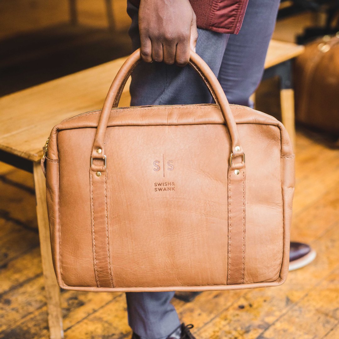 It's a simple classic briefcase made from genuine leather and certified to last a lifetime!
Customise it with our laser engraving option.

The Boaz briefcase is definitely a statement piece with several colours to choose from.