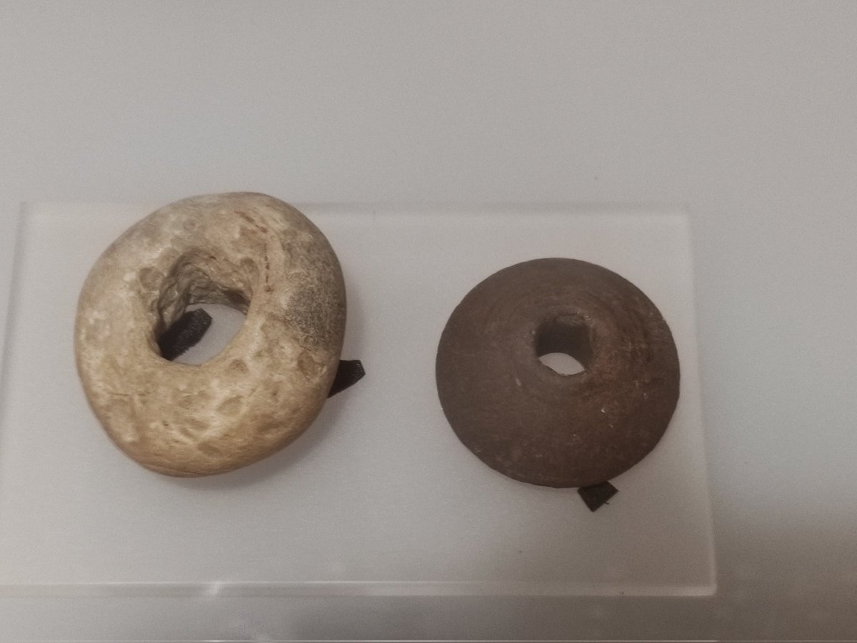 Couple of Roman spindle whorls from Pevensey, be interesting to know if they're from stratified Roman deposits...