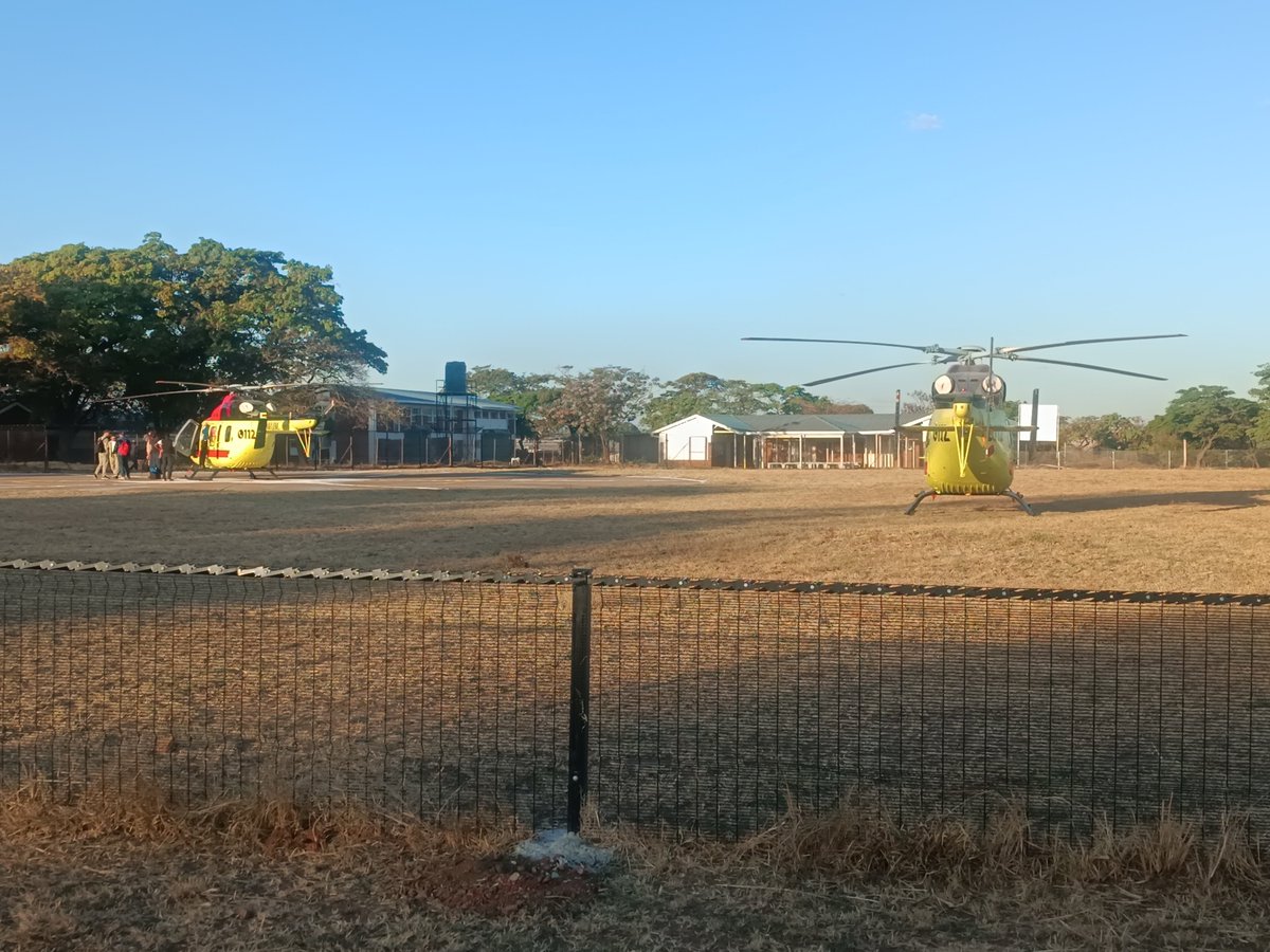 zanupf_patriots's tweet photo. Helicopters at Sally Mugabe Central Hospital.‼️

Two acquired from Russia earlier this year are stationed at the hospital.  

The air ambulance service reportedly carried its first patient from Chegutu to Harare on Saturday after she had suffered a cardiac arrest. https://t.co/d0msb6w3mZ
