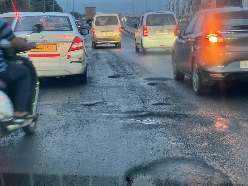 MadhishParikh's tweet photo. The road from Kalol to Mehsana is a disaster and full of risk. There are even huge craters on the bridges all way! 

The contractors must be immediately sacked and held accountable for substandard infrastructure for charging crores from the government & wasting public funds. 

It may cost a life! Let’s not wait to wake up then 😔