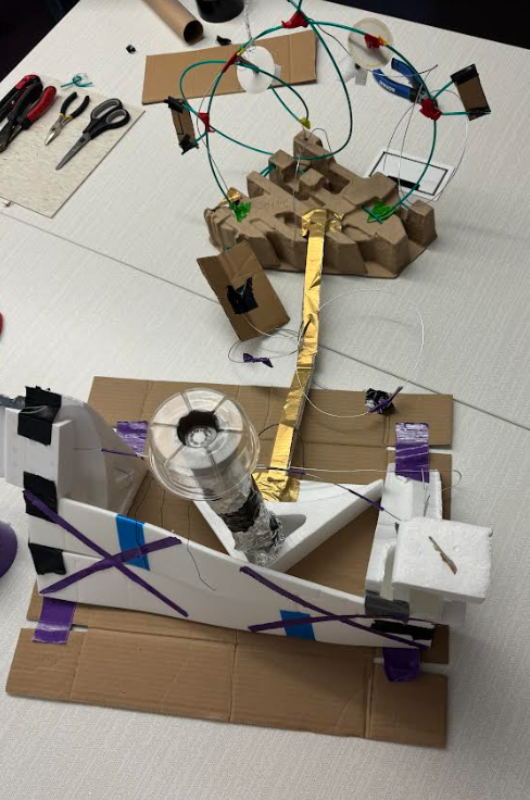 The revenue cycle programmers collaborated on this Tape &amp; Wire sculpture. Interested in a collaborative art workshop for your group? Reach out the Art Liaisons for more info!