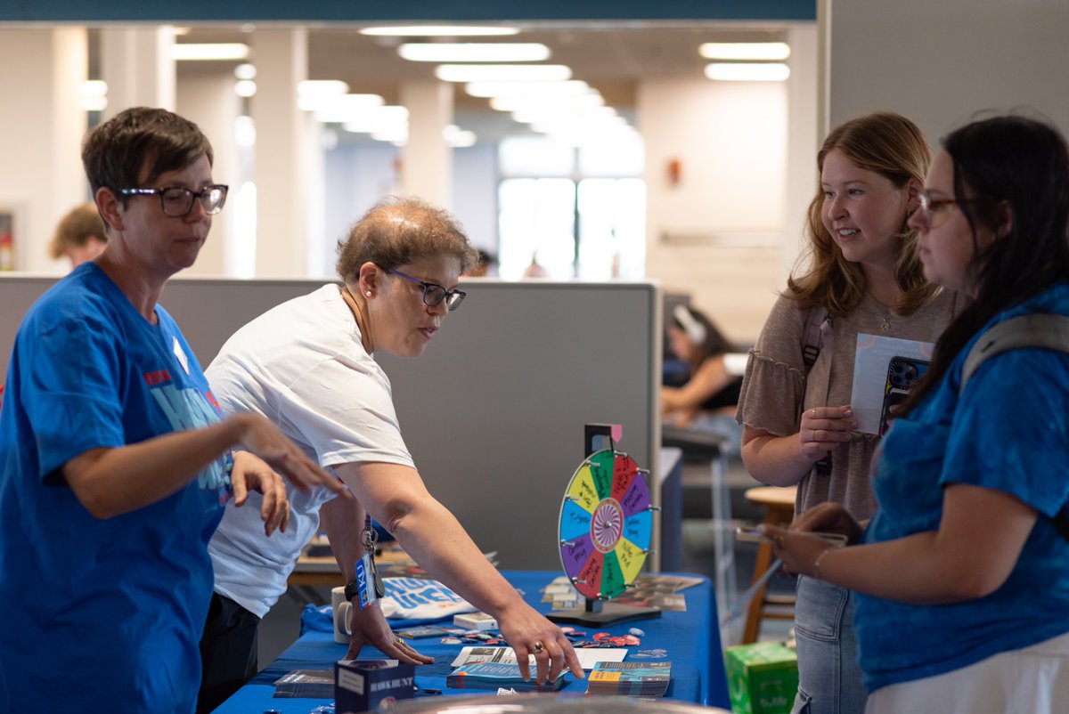 kulibraries's tweet image. All smiles at Watson Library’s Open House. #HawkWeek