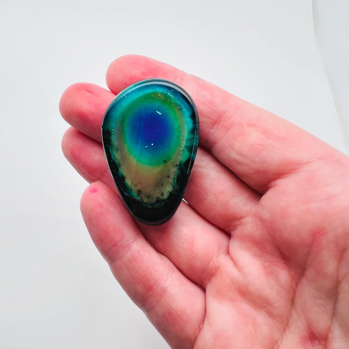 Ok, now that it’s no longer 106° in the sun I was able to get pics of the new color changing worry stone shaped pendant.
 
theZaonecklaces.etsy.com 

#worrystone #color #colorchanging #gift #giftideas #etsy #necklace #keychain #pendant #bestseller