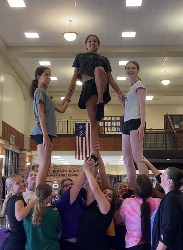 JV is getting pyramids ready for game day! 💜📣💛