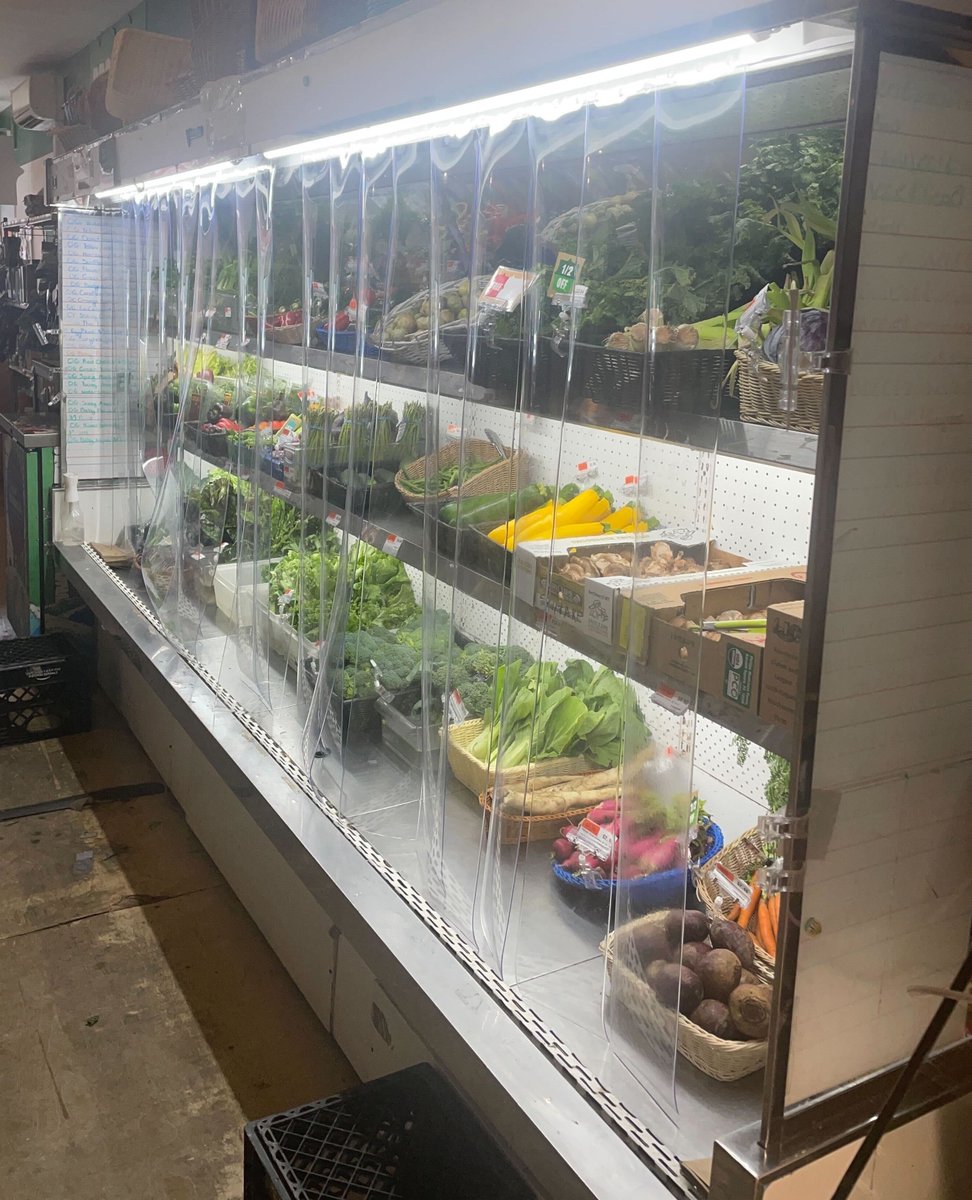 Our produce cooler is looking fantastic in...plastic!

Newly installed vinyl curtains on our produce fridge will help our sensitive vegetables stay fresh for longer in intense summer heat (like we're about to have again this week!) Plus they help keep us running efficiently. Yay!