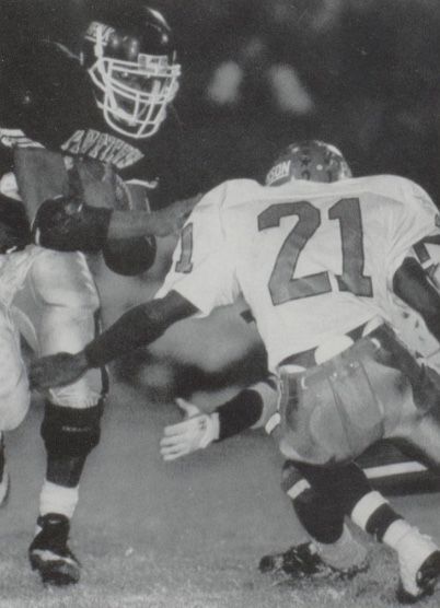 All-state back Chad Bell runs the ball for Norfolk against Omaha Benson in the 1994 Class A state title game.